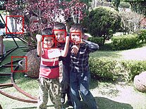 face recognition of boys in front of trees